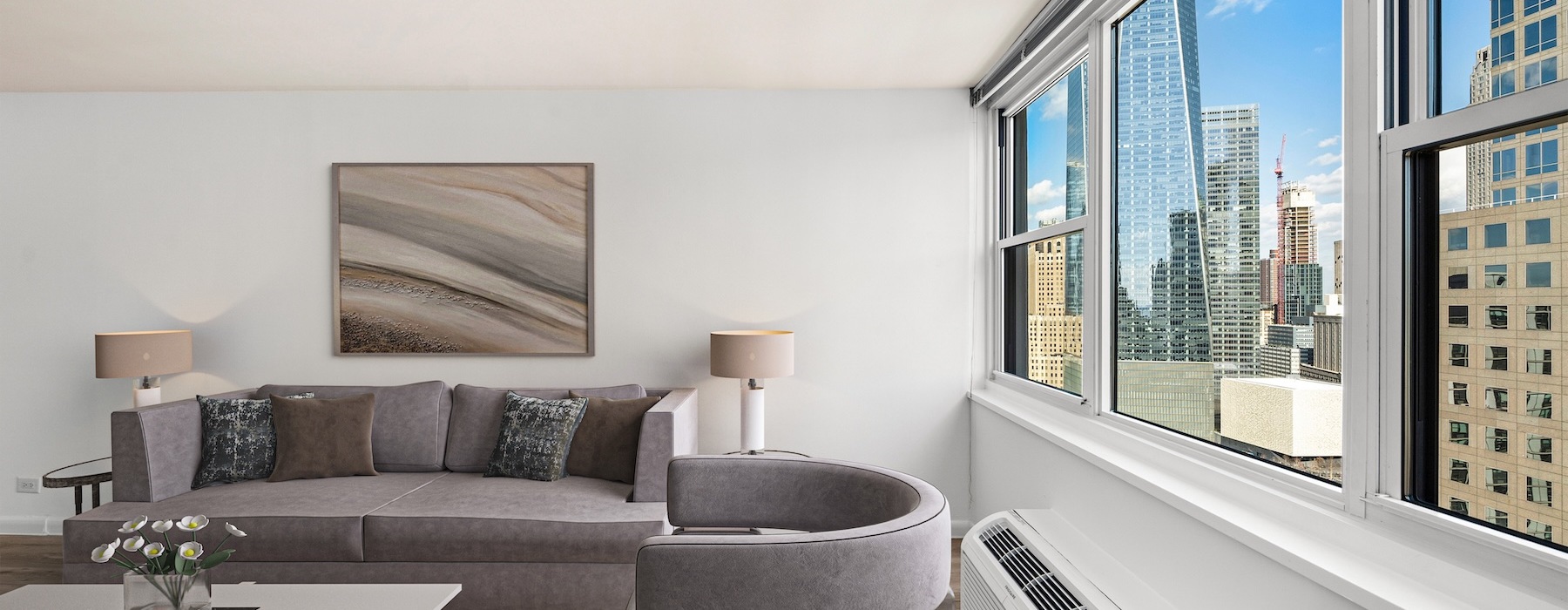 living area that includes ample seating spaces and bright lighting