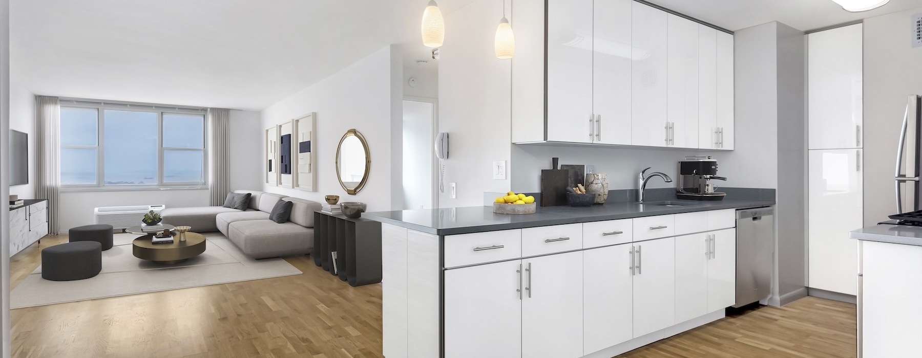 a kitchen with white cabinets